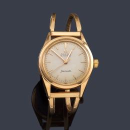 Lote 2554: OMEGA Seamaster de caballero con caja y brazalete en oro amarillo de 18 K.