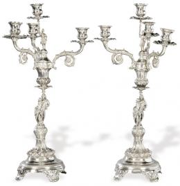 Lote 1171
Pareja de candelabros convertibles en candelero de plata española punonada de Gomez/? y Cristobal José de León, Córdoba 1880.