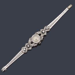 Lote 2427: Reloj-joya 'Art Decó' con diamantes talla brillante y sencilla en montura de platino. Años '30.