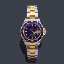 Lote 2540-A: ROLEX mod. Oyster Perpetual "Submariner" Superlative Chronometer Officially Certified. Ref. 16613, reloj para caballero con caja y brazalete en acero y oro de 18 K.