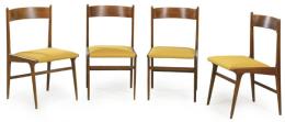 Lote 1331
Conjunto de cuatro sillas en madera y tapicería de tela amarilla.
Italia, años 50