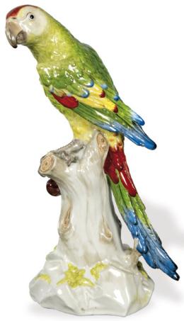 Lote 1410: Figura de loro sobre un tronco de árbol de cerezo en porcelana pintada y esmaltada de Rudolstadt Volkstedt. Con marca en azul cobalta.
Alemania, 1890