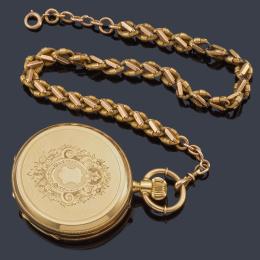 Lote 2608: Reloj saboneta con caja en oro amarillo de 18 K y leontina en oro amarillo de 18 K. Estuche original
