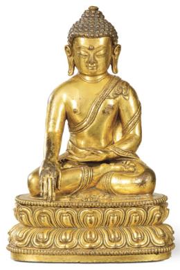 Lote 1388
"Buda Sakyamuni Sentado" en bronce dorado y patinado, Nepal S. XVIII.