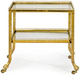 Lote 1482: Mesa auxiliar atribuida a Maison Jansen en metal dorado con baldas de cristal. S. XX
