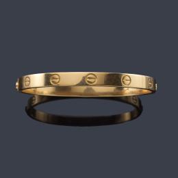 Lote 2328: CARTIER<br>Pulsera de la colección 'LOVE' realizado en oro amarillo de 18K.