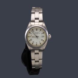 Lote 2581<br>ROLEX Oyster Perpetual Date ref.6916 de señora con caja y brazalete en acero.Con estuche y documentación