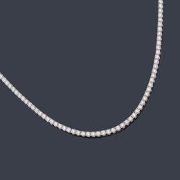 Lote 2247<br>Collar rivière con brillantes de aprox. 24,62ct en total en montura de oro blanco de 18K.