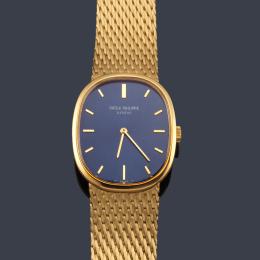 Lote 2511<br>PATEK PHILIPPE Ellipse de caballro con caja y brazalete en oro amarillo de 18 K.