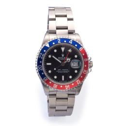 Lote 2521: ROLEX mod. Oyster Perpetual "GMT Master" Superlative Chronometer Officially Certified. Ref. 16700. Reloj para caballero con caja y brazalete en acero. Con estuche.