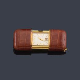 Lote 2536<br>MOVADO Ermeto nº 179  reloj de viaje con caja dorada y piel.