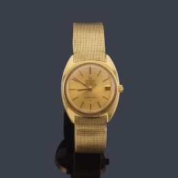 Lote 2552: OMEGA Constellation de caballero con caja y brazalete en oro amarillo de 18 K.