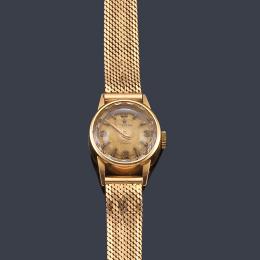 Lote 2561: FESTINA de señora con caja y brazalete en oro rosa de 18 K.