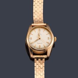 Lote 2563: OMEGA Seamaster Ladrymatic de señora con caja y brazalete en oro rosa de 18 K.