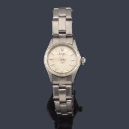 Lote 2565<br>ROLEX  Oyster Perpetual Date  Ref. 6623. Reloj de señora con caja y brazalete en acero.