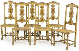 Lote 1085: Conjunto de 10 sillas siguiendo modelos del siglo XVIII en madera de pino torneada, tallada y pintada con asiento de enea. Siglo XX