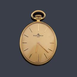 Lote 2506: BAUME & MERCIER, reloj de colgar con caja en oro amarillo de 18 K.