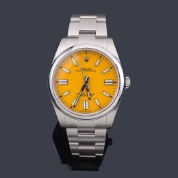 Lote 2553: ROLEX Oyster Perpetual ref. 124300 amarillo Superlatiave Chronometer Officially Certified de caballero con caja y brazalete en acero. Con estuche y documentación.