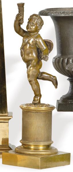 Lote 1079: "Cupido con Antorcha" de bronce dorado, Francia S. XIX.<br>Sobre columna estriada.