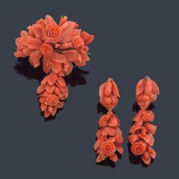 Lote 2015: Conjunto de pendientes y broche con motivos florales realizados en coral tallados. Mediados S. XIX.