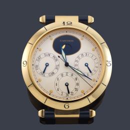 Lote 2546<br>CARTIER Pasha Moon Phase, reloj de mesa en metal dorado y laca color azul.