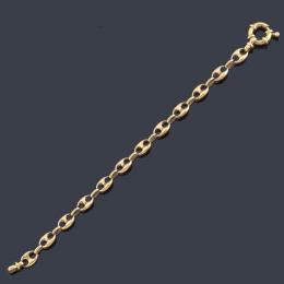 Lote 2298: Pulsera con eslabón tipo 'Gucci' en oro amarillo de 18K.