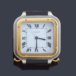 Lote 2517: CARTIER Santos, reloj de viaje despertador con caja en acero y esmalte.