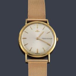 Lote 2545: JAEGER LE COULTRE de caballero con caja y brazalete en oro rosa de 18 K.