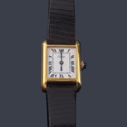 Lote 2593: CARTIER Tank de señora con caja chapada en oro.