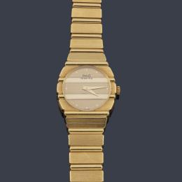 Lote 2606: PIAGET Polo ref. 861C701 de señora con caja y brazalete en oro amarillo de 18 K.