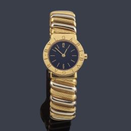 Lote 2609<br>BULGARI Ref. BB23 2 T para señora con caja y brazalete en oro amarillo y blanco de 18 K. Con estuche y documentación.