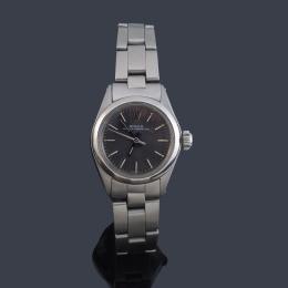 Lote 2619: ROLEX  Oyster Perpetual Date  Ref. 6618. Reloj de señora con caja y brazalete en acero.