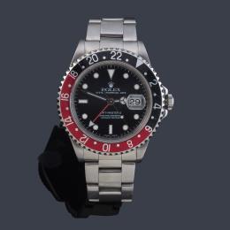 Lote 2631: ROLEX mod. Oyster Perpetual "GMT Master" Superlative Chronometer Officially Certified. Ref. 16710. Reloj para caballero con caja y brazalete en acero.